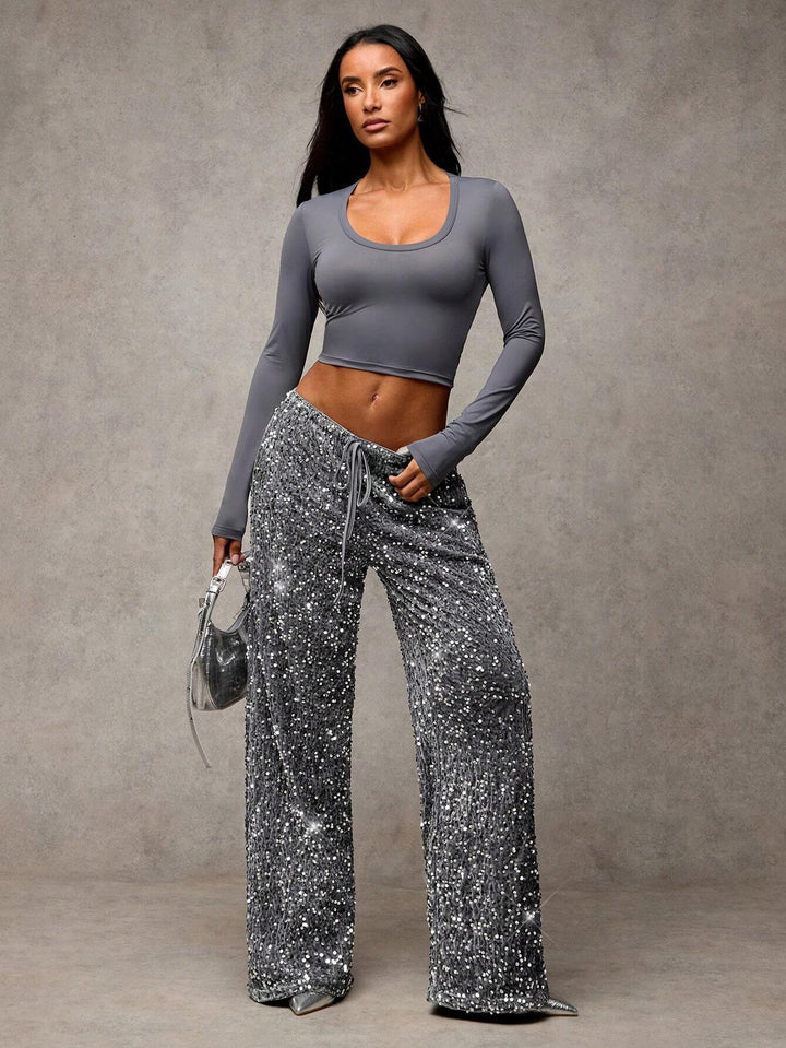 Sorvienne Relaxed Drawstring Wide Leg Sequin Trousers in Silver