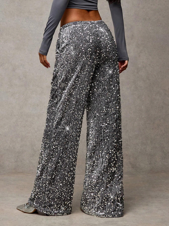 Sorvienne Relaxed Drawstring Wide Leg Sequin Trousers in Silver