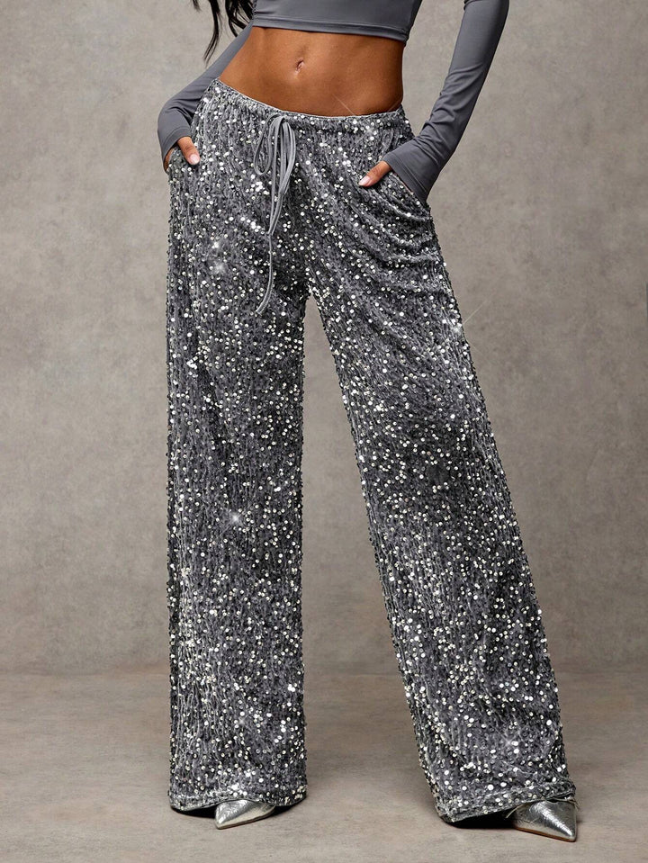 Sorvienne Relaxed Drawstring Wide Leg Sequin Trousers in Silver