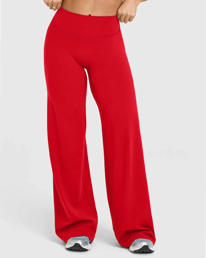 Sorvienne Relaxed High Waisted Flared Leggings in Red