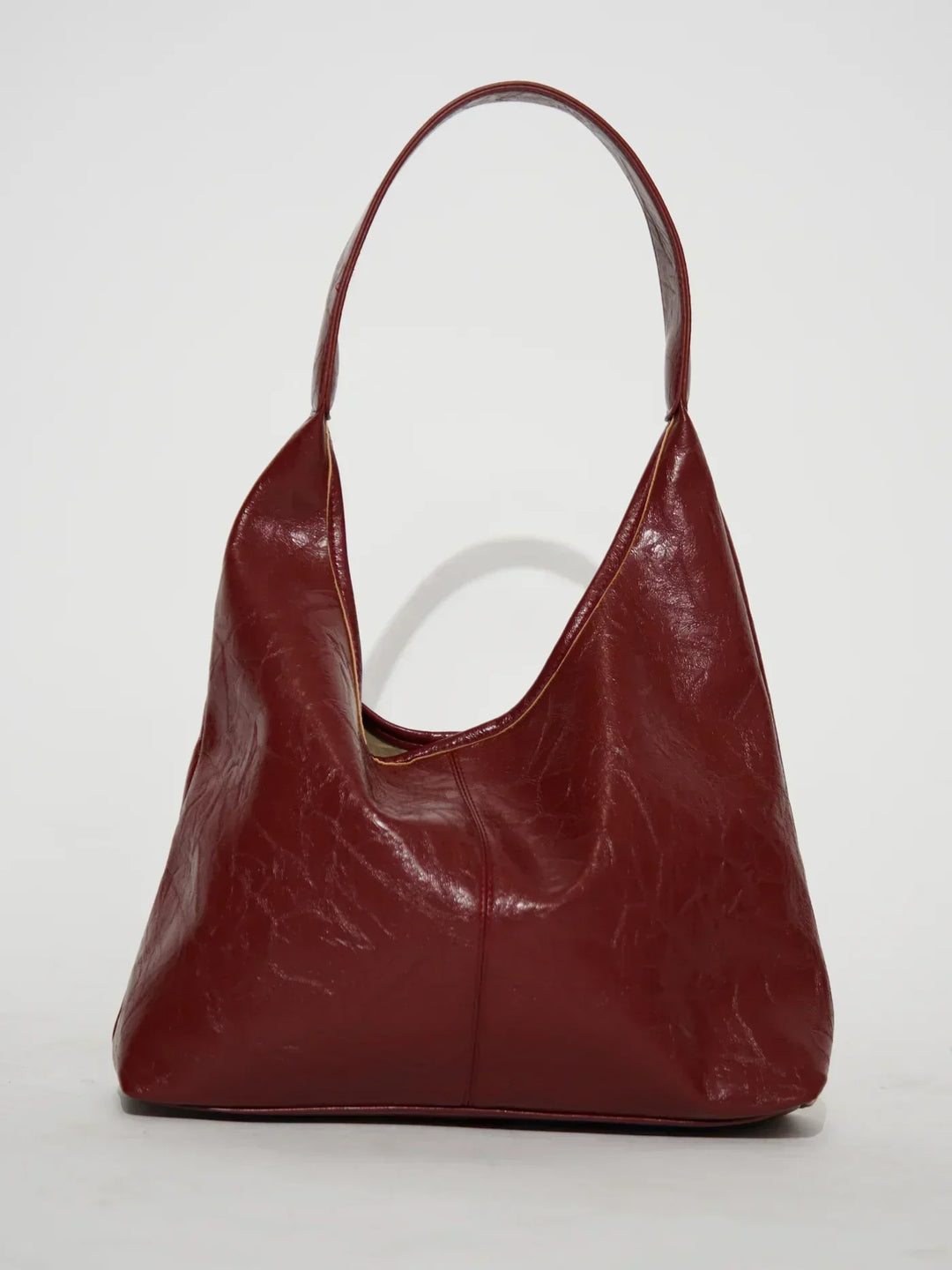 Sorvienne Slouchy Glossy Faux Leather Shoulder Bag in Burgundy