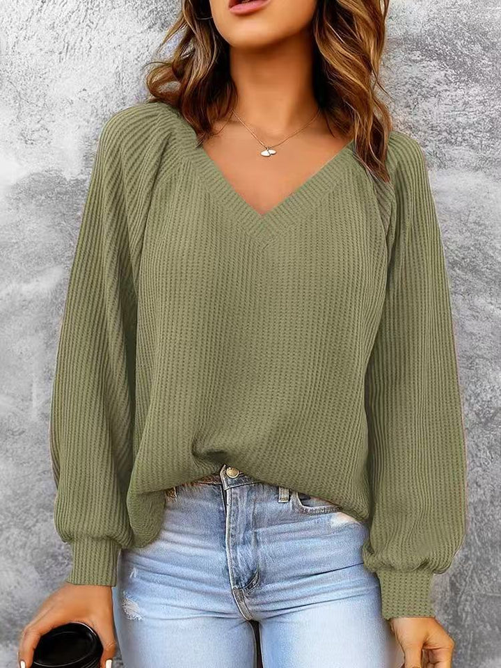 Sorvienne Relaxed Raglan Rib V Neck Jumper in Olive