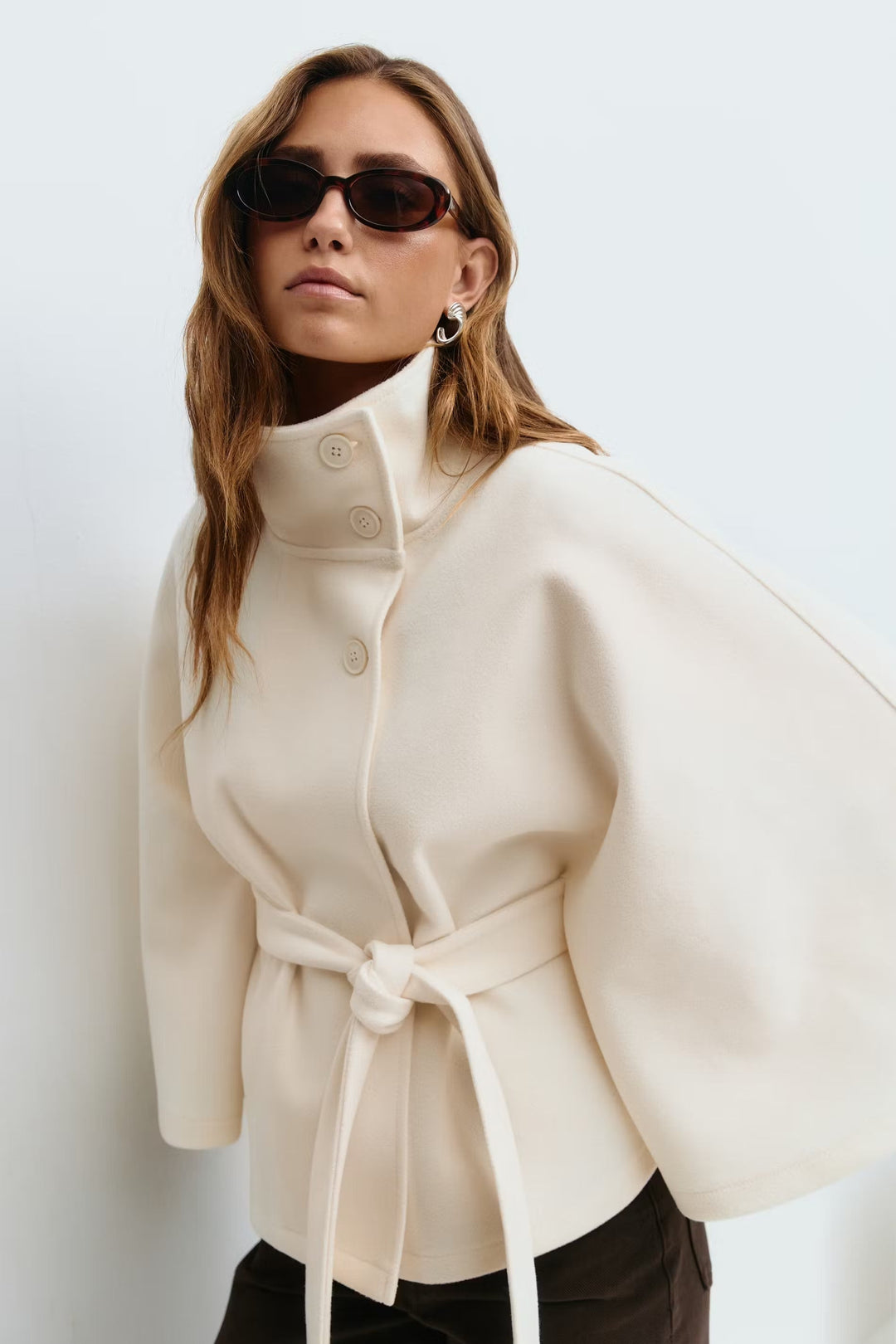Sorvienne Oversized Belted Funnel Neck Cape Coat in Cream