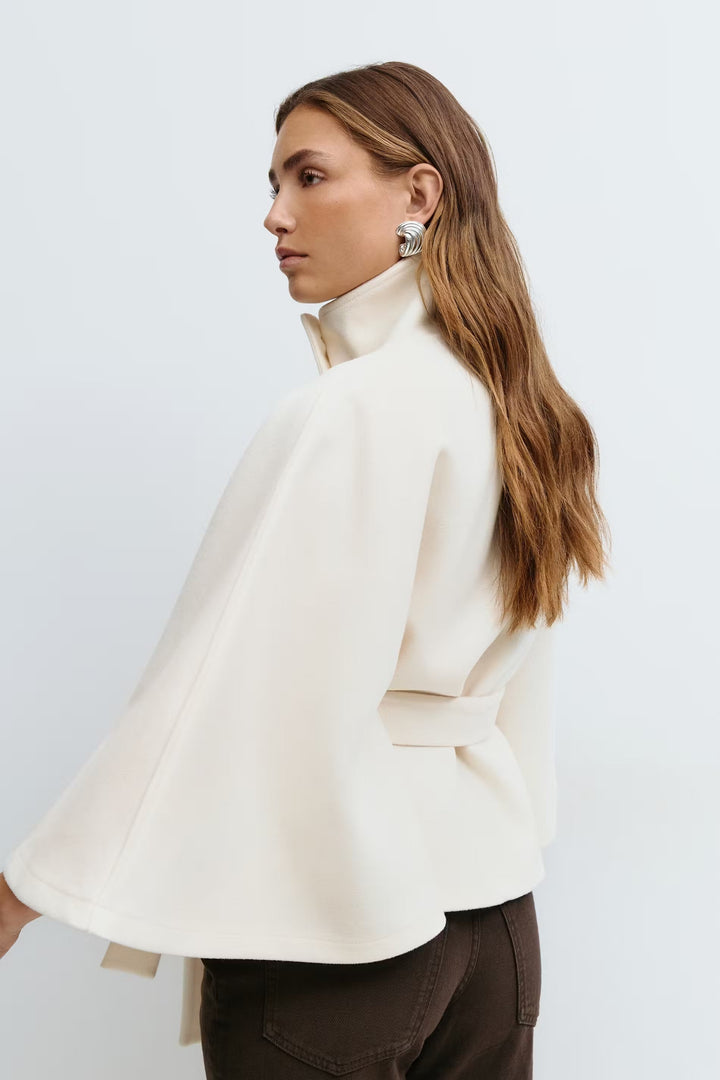 Sorvienne Oversized Belted Funnel Neck Cape Coat in Cream