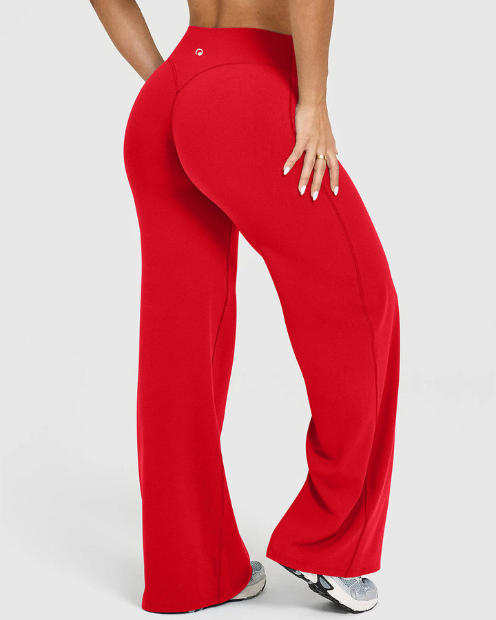 Sorvienne Relaxed High Waisted Flared Leggings in Red