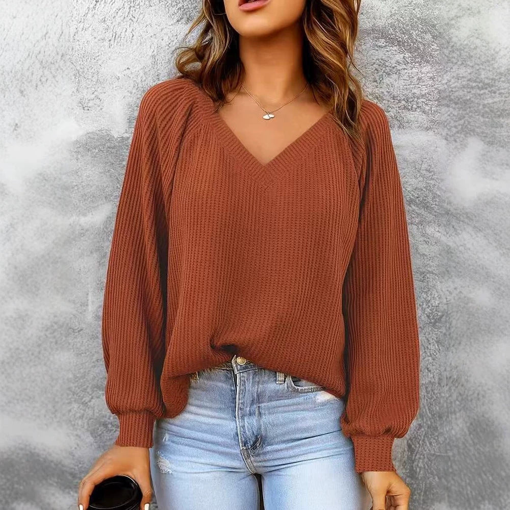 Sorvienne Relaxed Raglan Rib V Neck Jumper in Rust