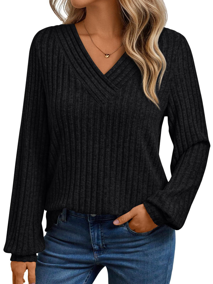 Sorvienne Relaxed Ribbed V Neck Jumper in Black
