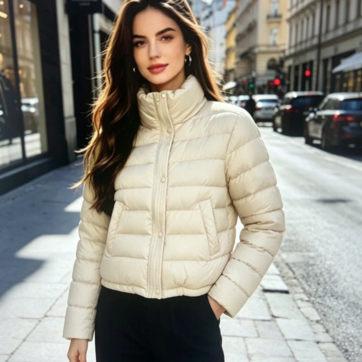 Sorvienne Relaxed Funnel Neck Cropped Puffer Jacket in Cream