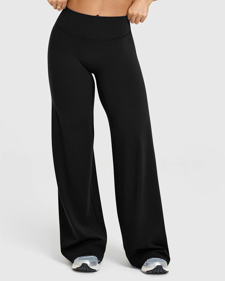 Sorvienne Relaxed High Waisted Flared Leggings in Black