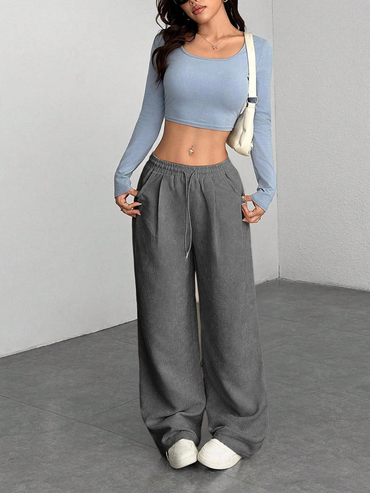 Sorvienne Relaxed Drawstring Wide Leg Cord Trousers in Grey