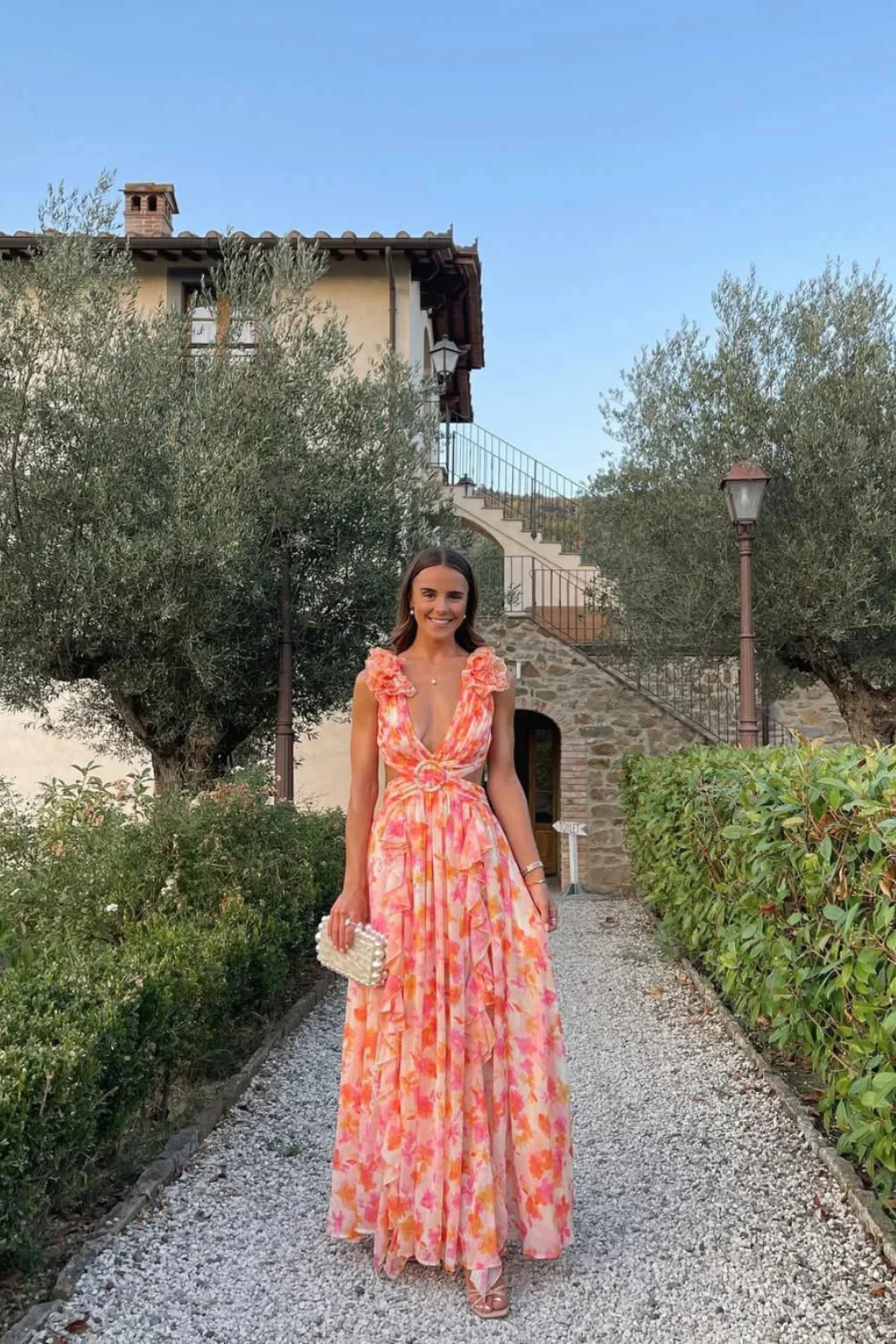 Sorvienne Floral Ruffle V-Neck Flowing Maxi Dress in Orange