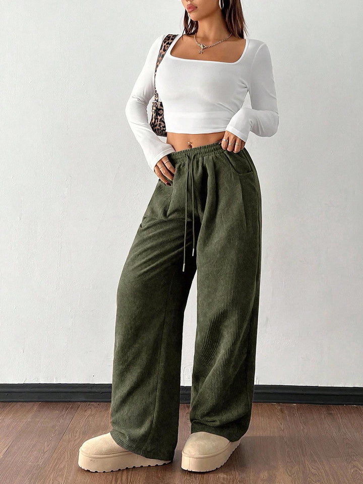 Sorvienne Relaxed Drawstring Wide Leg Cord Trousers in Olive