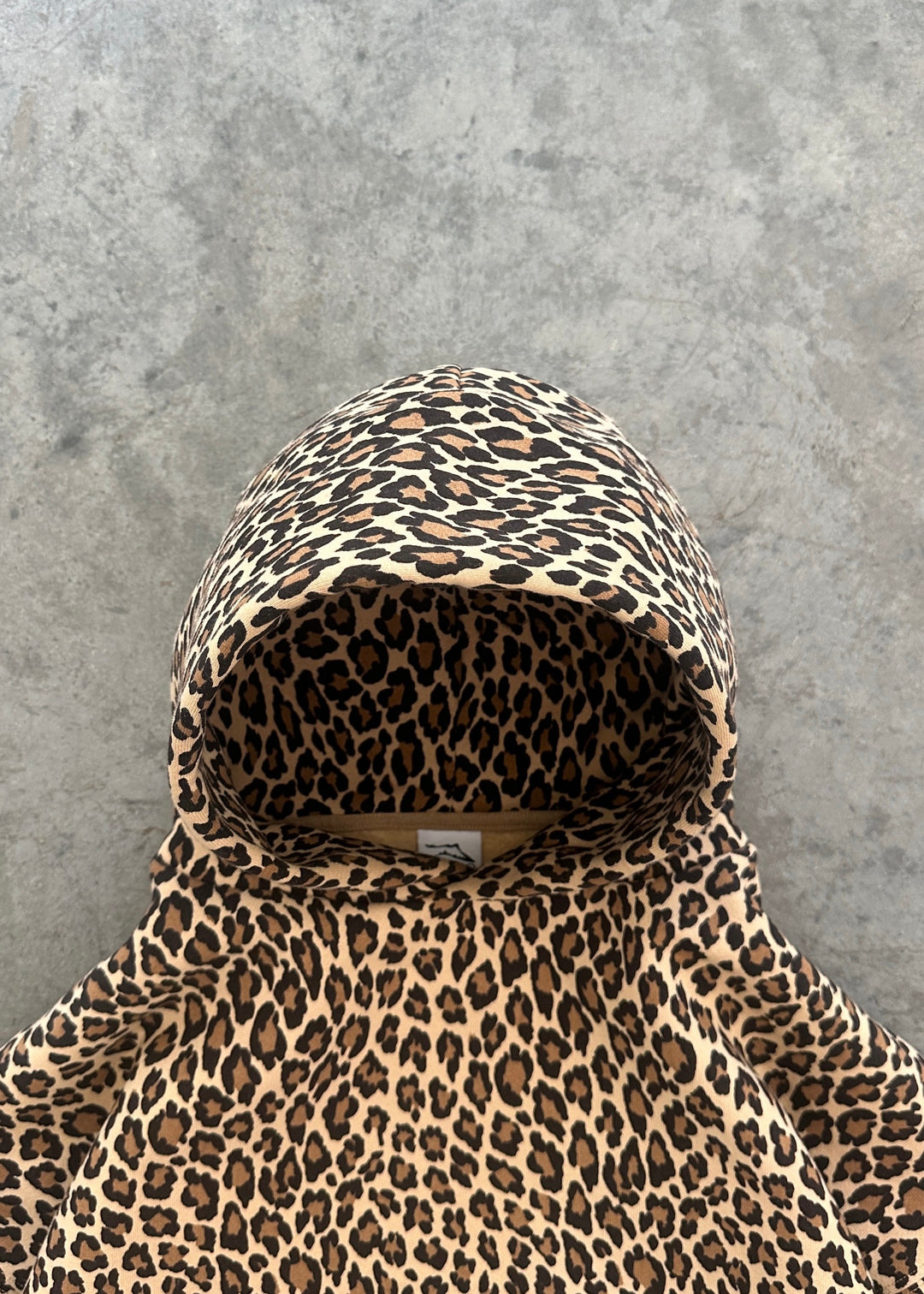 Sorvienne Relaxed Leopard Print Hoodie