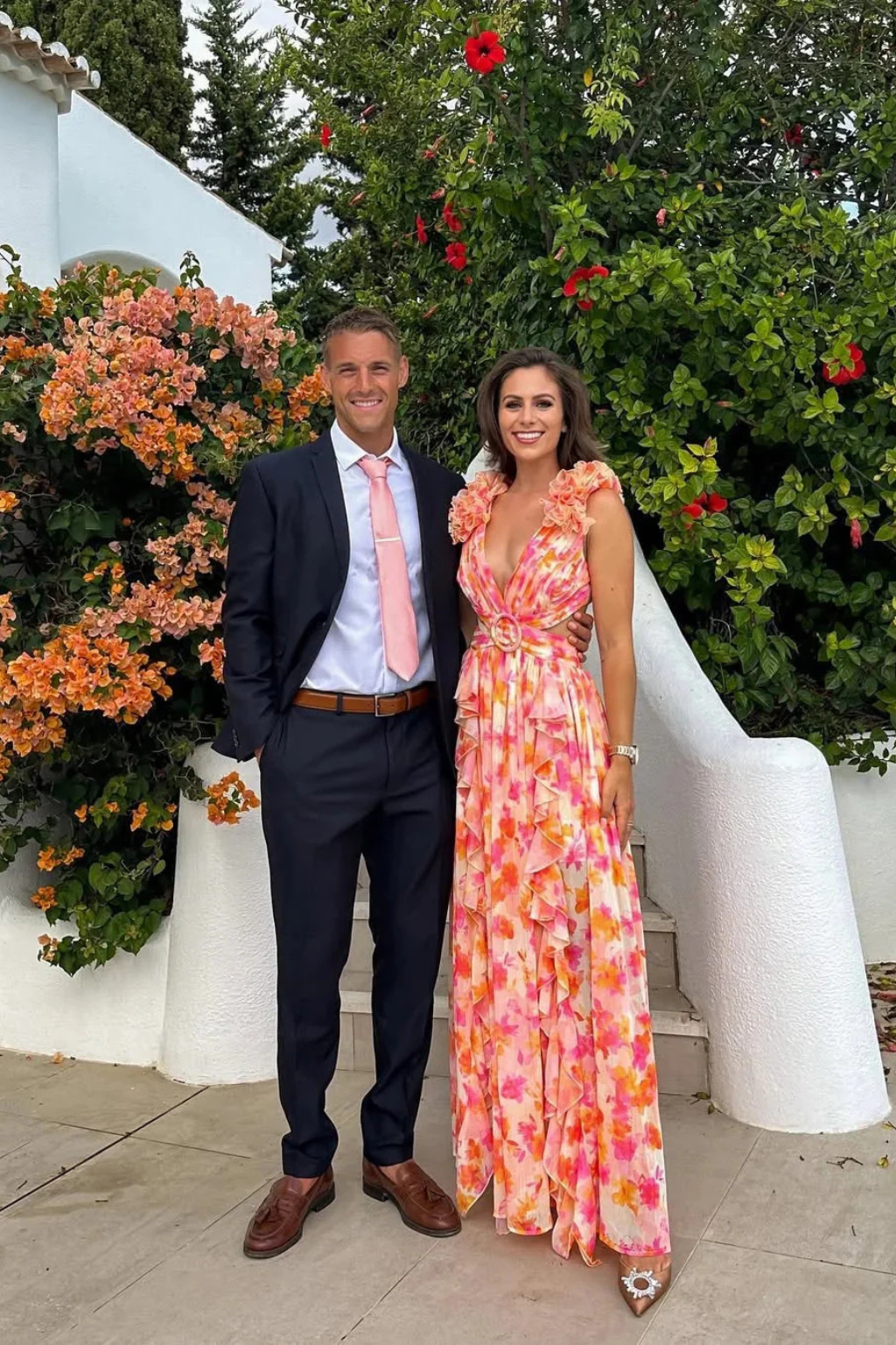 Sorvienne Floral Ruffle V-Neck Flowing Maxi Dress in Orange