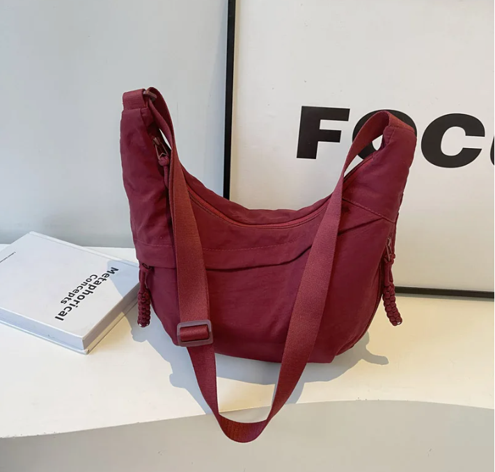 Sorvienne Oversized Slouchy Crescent Crossbody Bag in Burgundy