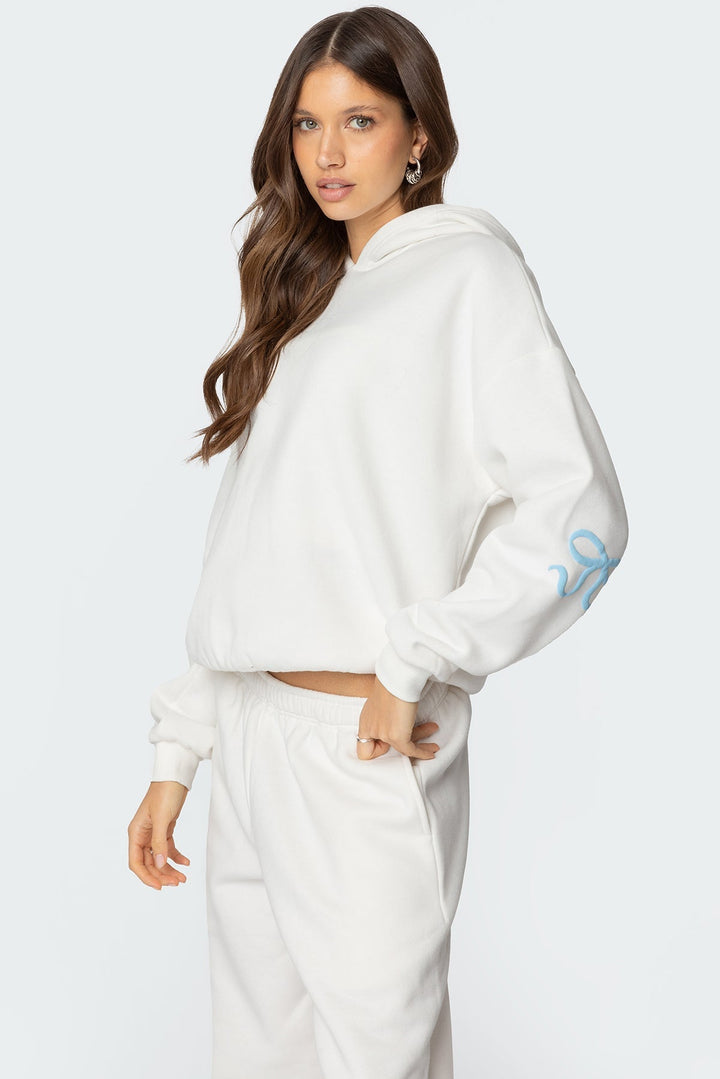 Sorvienne Relaxed Bow Embroidered Hoodie and Joggers Set in Cream