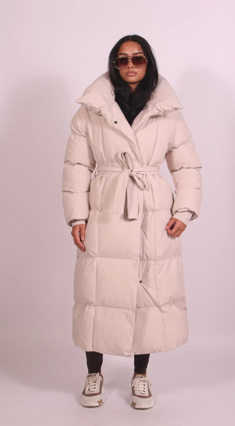 Sorvienne Belted Maxi Puffer Coat in Beige