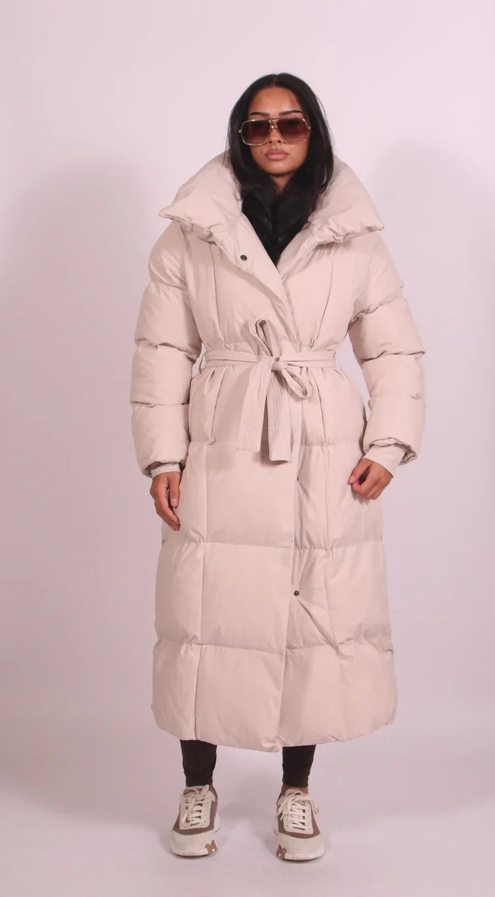 Sorvienne Belted Maxi Puffer Coat in Beige
