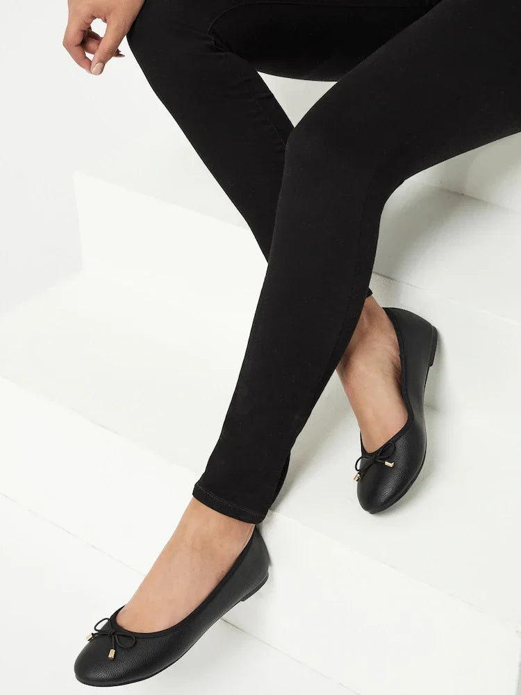 Sorvienne Round Toe Bow Ballet Pumps in Black