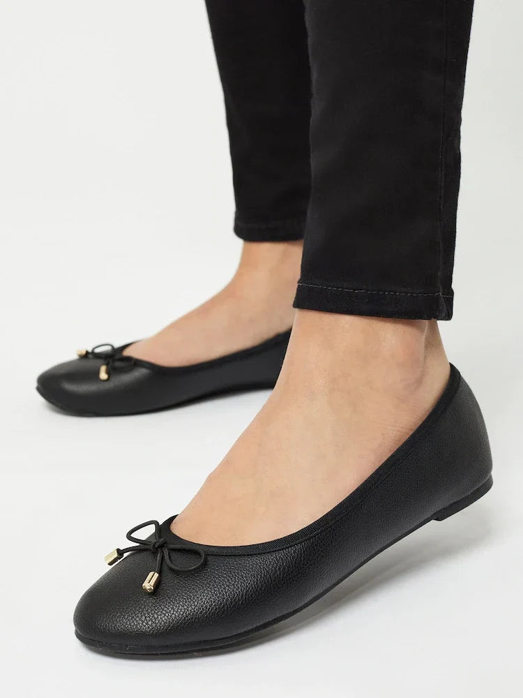 Sorvienne Round Toe Bow Ballet Pumps in Black
