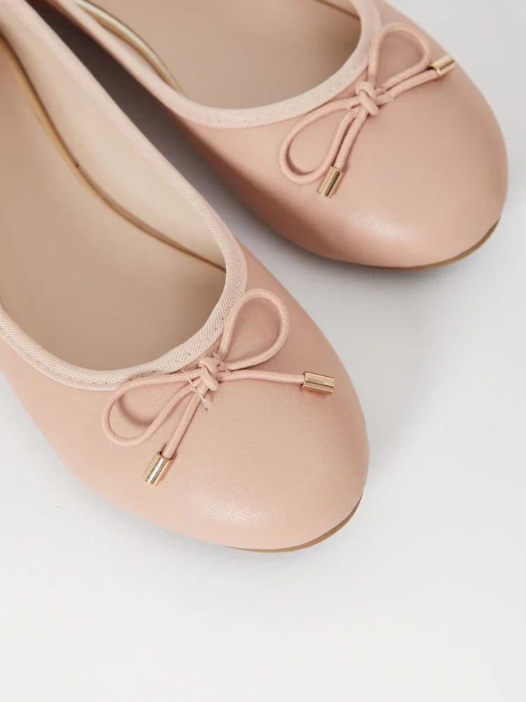 Sorvienne Round Toe Bow Ballet Pumps in Nude