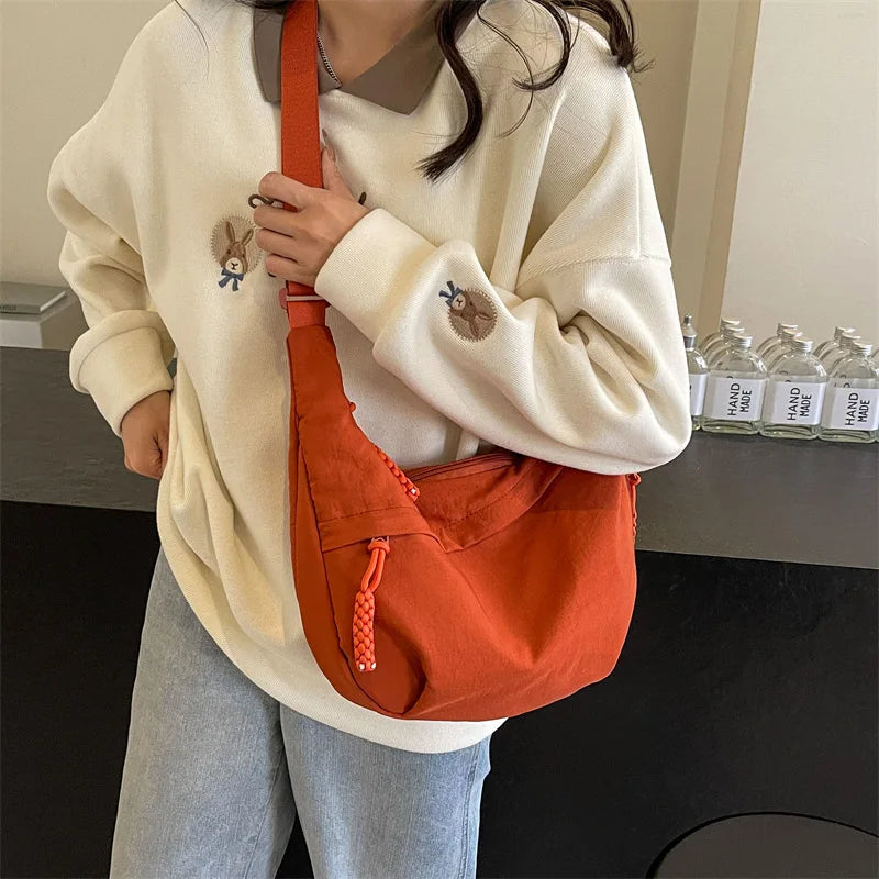 Sorvienne Oversized Slouchy Crescent Crossbody Bag in Orange