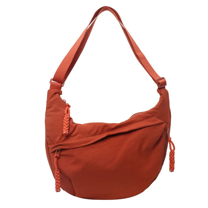 Sorvienne Oversized Slouchy Crescent Crossbody Bag in Orange