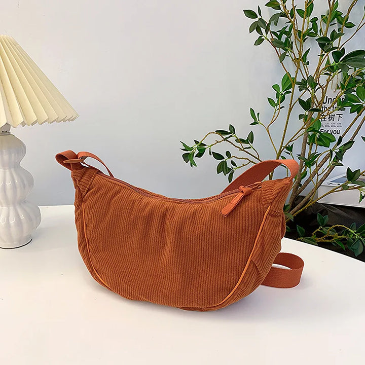 Sorvienne Small Crescent Cord Crossbody Bag in Rust