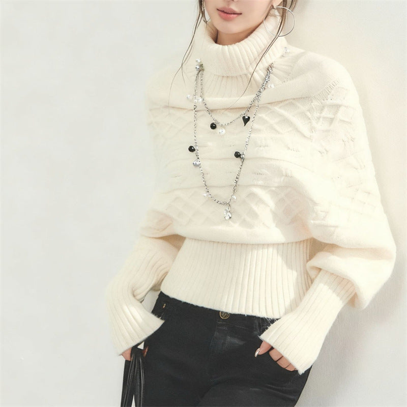 Sorvienne Batwing Cable Knit Roll Neck Jumper in Cream