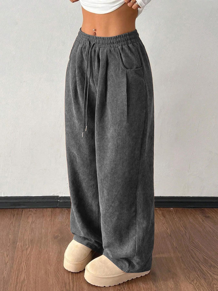 Sorvienne Relaxed Drawstring Wide Leg Cord Trousers in Grey