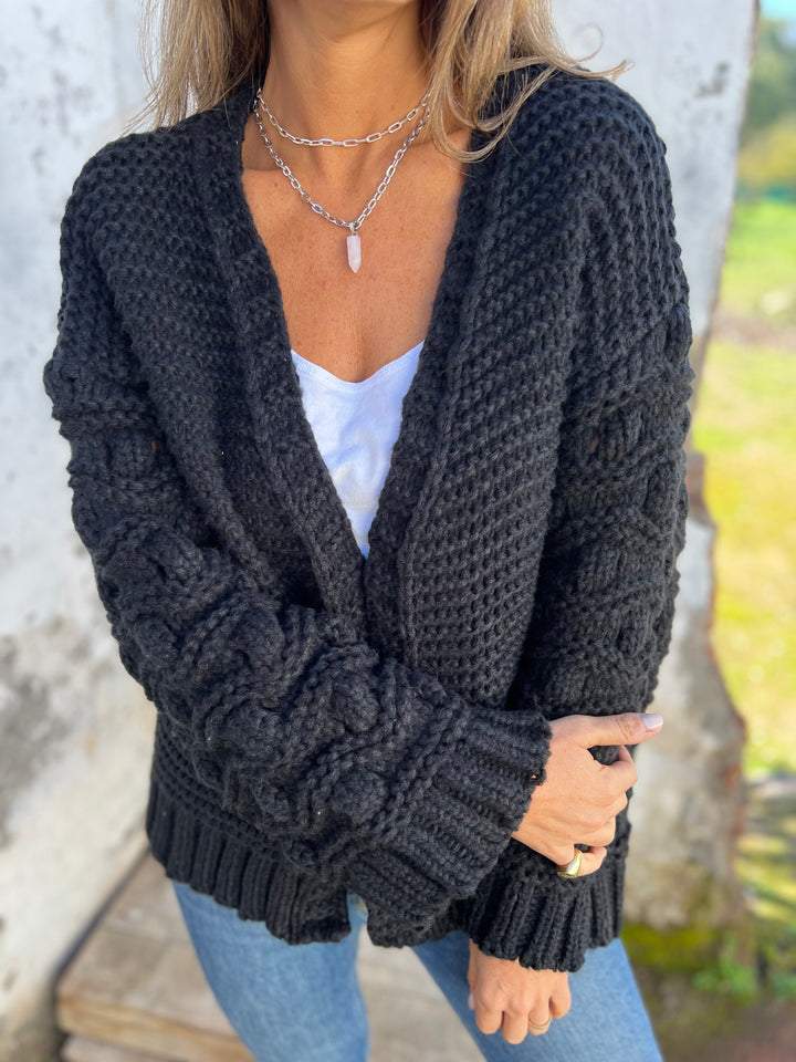 Sorvienne Relaxed Open Front Chunky Knit Cardigan in Black