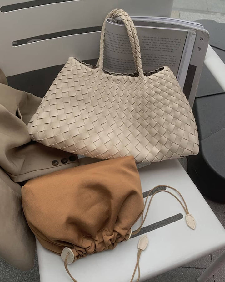 Sorvienne Structured Crescent Woven Handbag in Cream